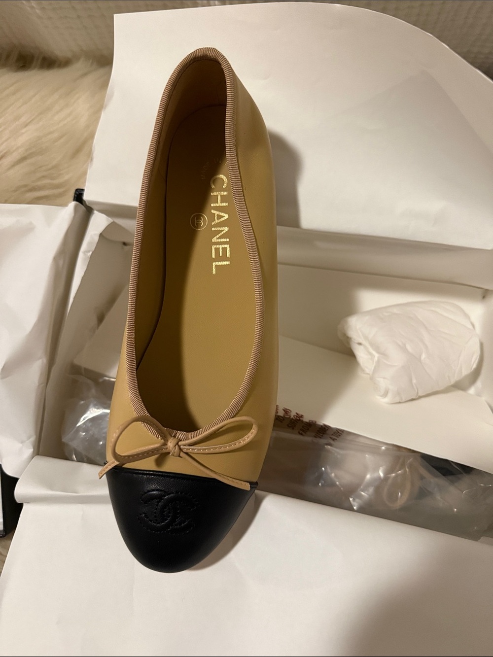 CHANEL Beige and Black Leather Cap Toe Ballet Flat